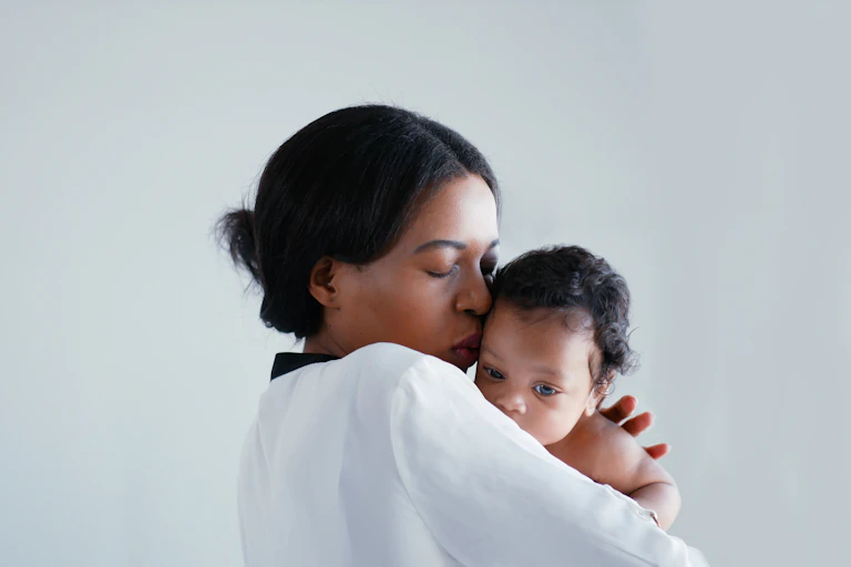 Mother cradling her child