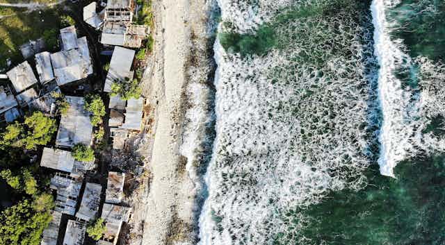 Houses in Tuvalu, the world’s fourth-smallest country, where the sea rises by five millimeters each year, driving flooding, storm surges, saltwater intrusion and coastal erosion.
