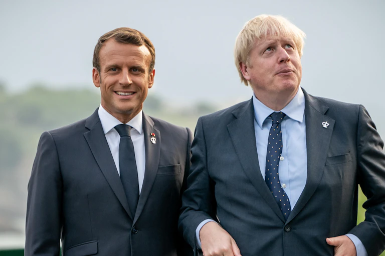 Emmanuel Macron and Boris Johnson posing for a photo in Cornwall.