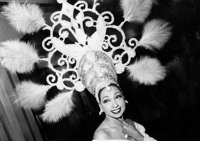 Josephine Baker wearing an ornate headdress.