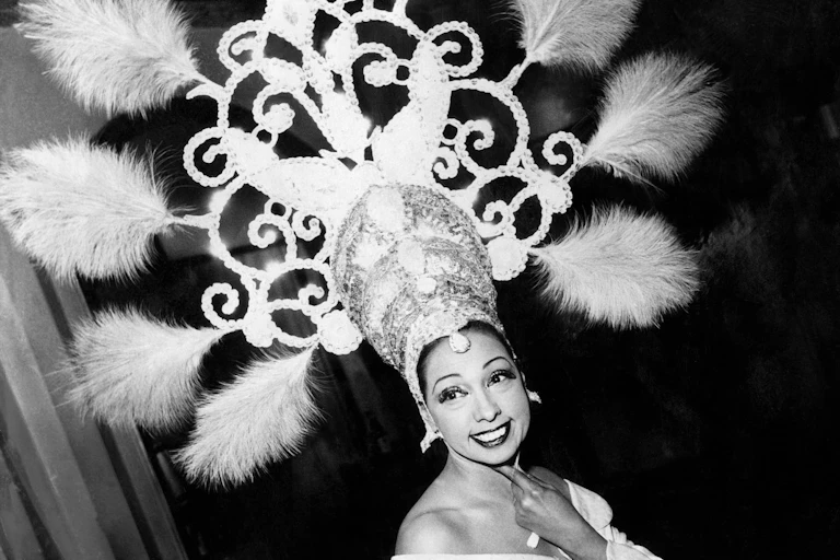 Josephine Baker wearing an ornate headdress.