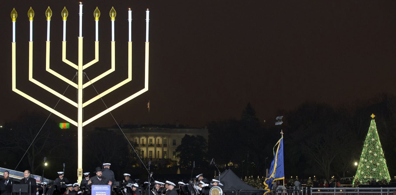 Biden brings a menorah lighting back to the White House, rededicating a