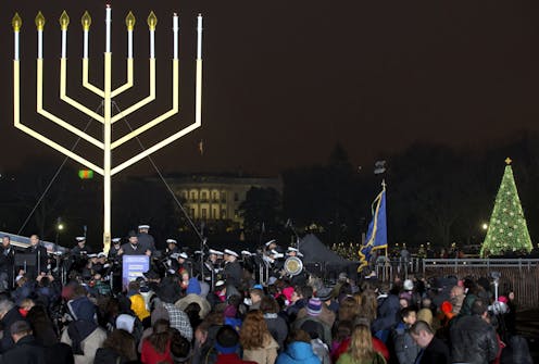 Biden brings a menorah lighting back to the White House, rededicating a Hanukkah tradition from the 20th century