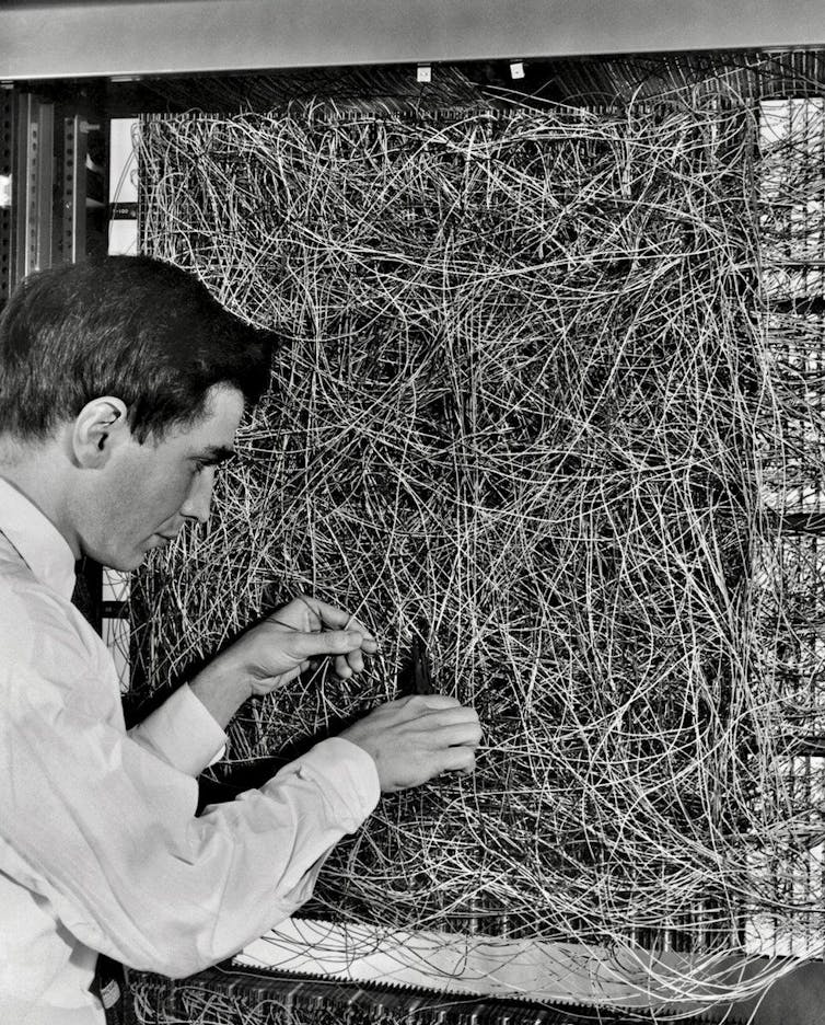 One of the first neural networks, the Mark I Perceptron, was built in the 1950s. The goal was to classify digital images, but results were disappointing. Image via Cornell University