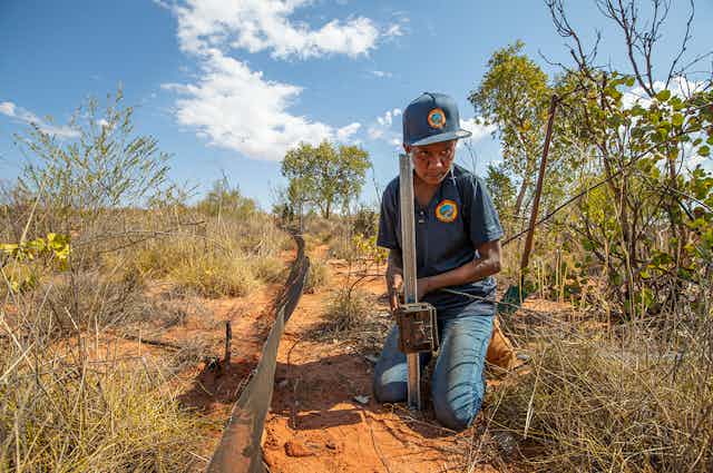 Indigenous ranger working on Country 