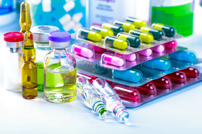 Medication and vials of vaccine.