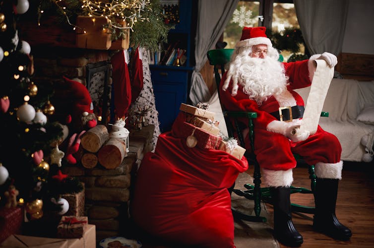How Christmas became an American holiday tradition, with a Santa Claus, gifts and a tree