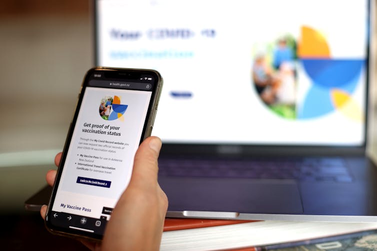 Image of someone setting up their vaccine pass on their phone