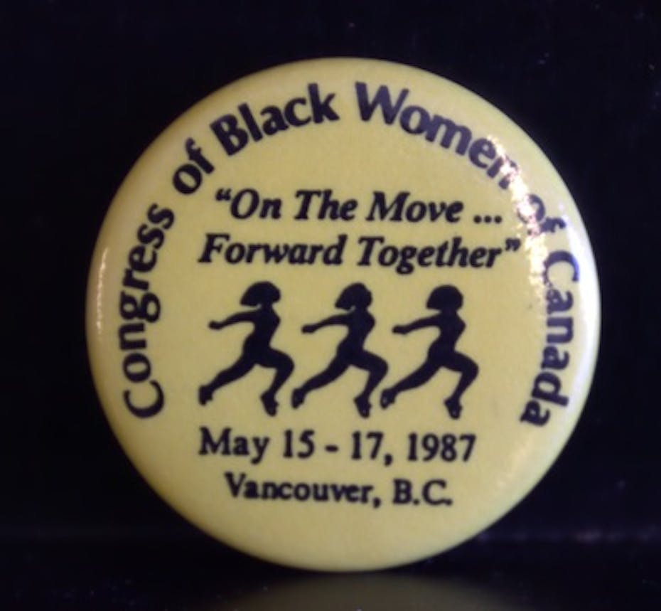 A button from Congress of Black Women of Canada showing silhouettes of Black women in a row