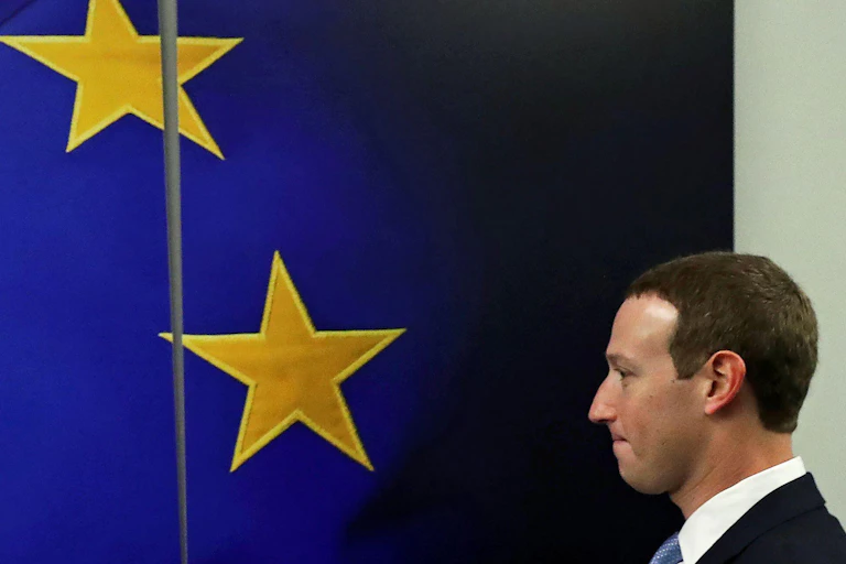 Mark Zuckerberg in front of an EU flag