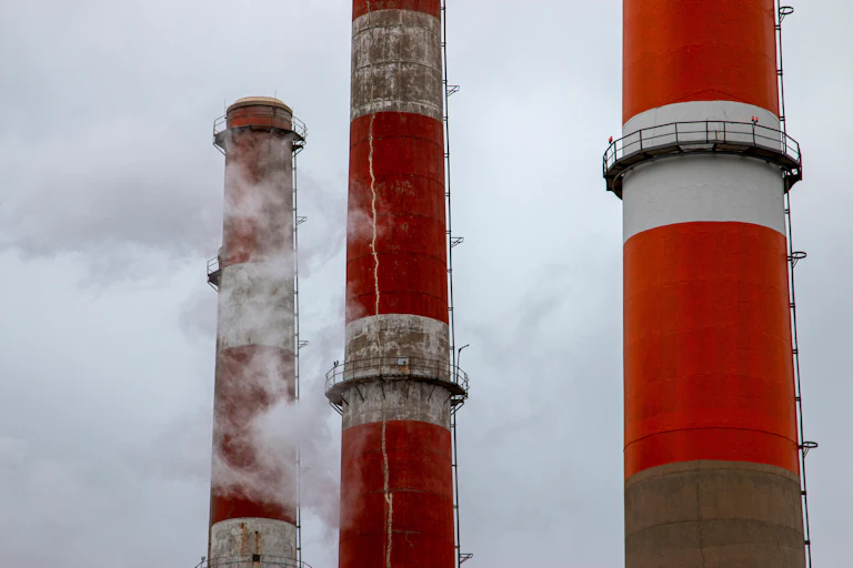 Red and white banded smoke stacks.