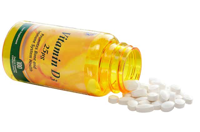 Bottle of vitamin D pills