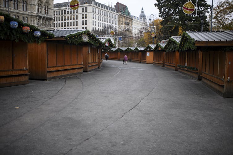 Closed Christmas market on the first day of a nationwide lockdown in Vienna, Austria.