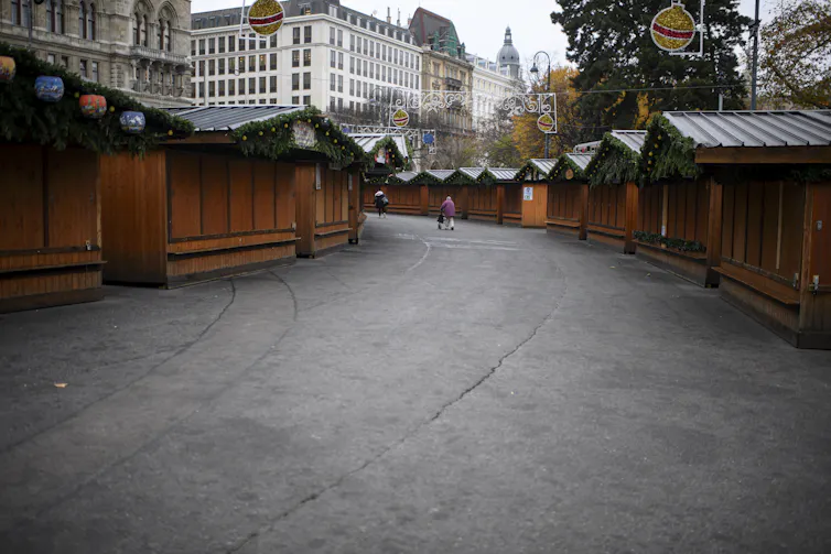 Closed Christmas market on the first day of a nationwide lockdown in Vienna, Austria.