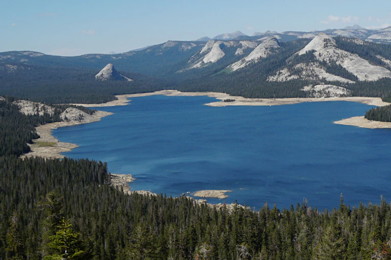 View of a reservoir with a "bathtub ring" showing how its water supply has fallen