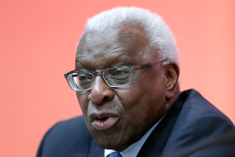 A head-and-shoulders portrait of an elderly man wearing a suit.