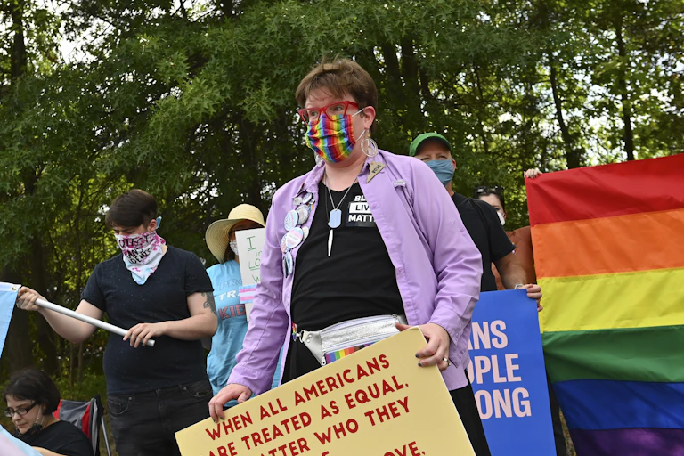 Transgender rights supporters march.