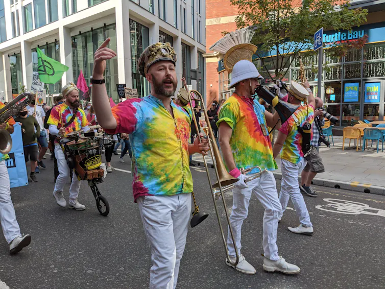 Colourful brass band at a protest