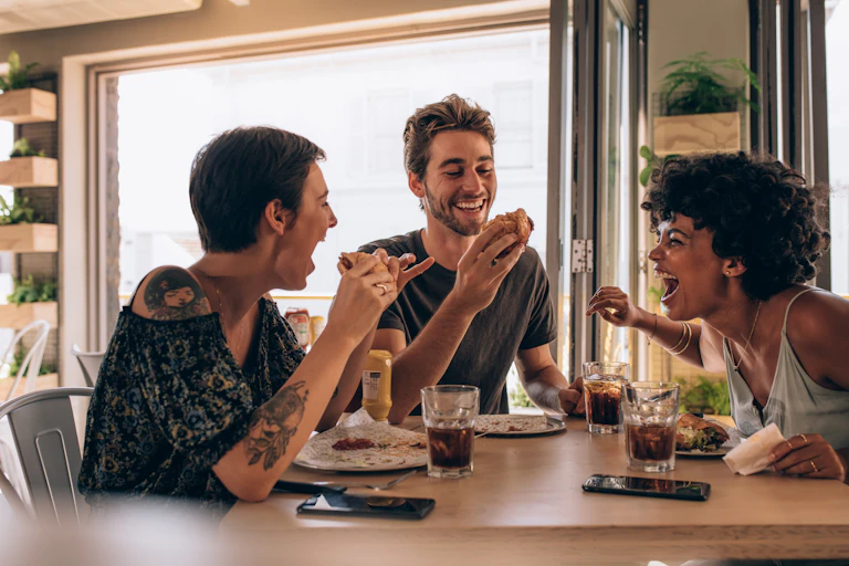 Friends eating a meal together