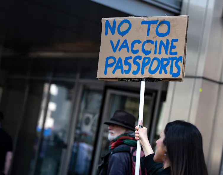 Woman holding a sign