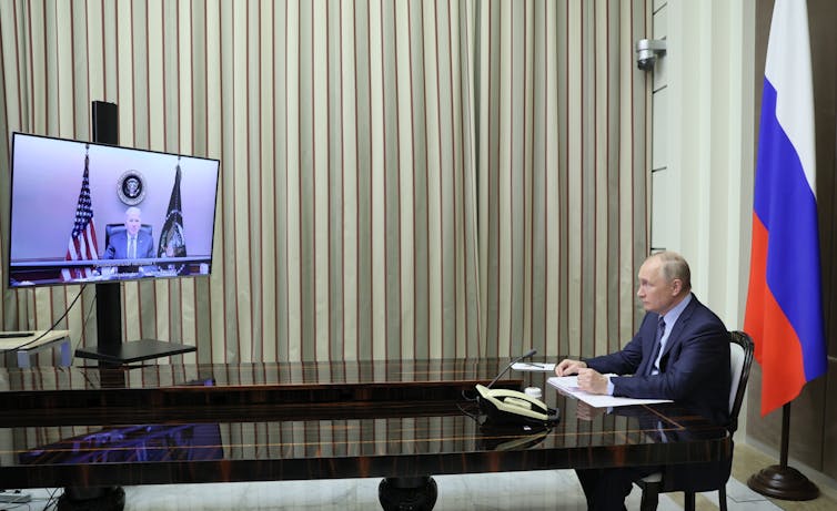 Russian President Vladimir Putin meets with U.S. President Joe Biden via videoconference on Tuesday, Dec. 7, 2021.