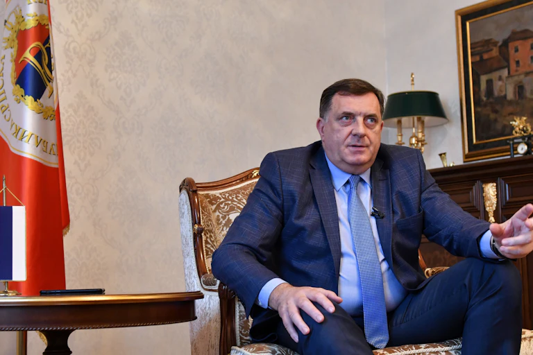 Bosnian Serb leader Milorad Dodik gestures while seated.
