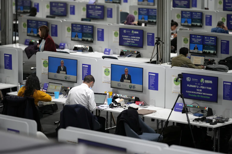 Journalists working at COP26, a global climate change summit