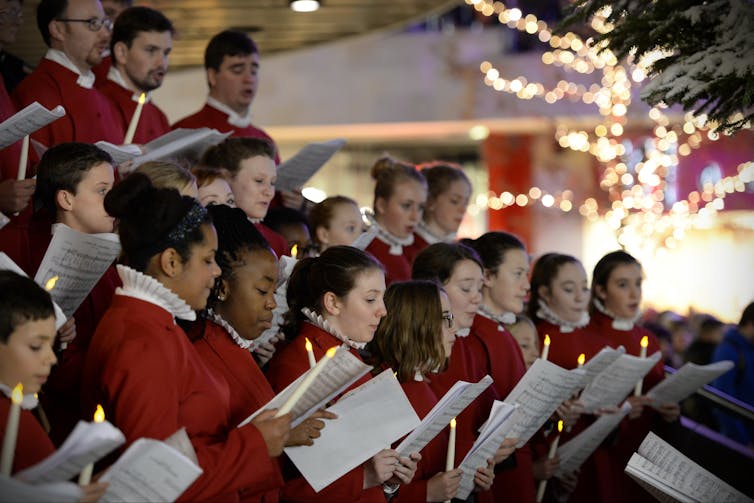 A choir singing Xmas carols