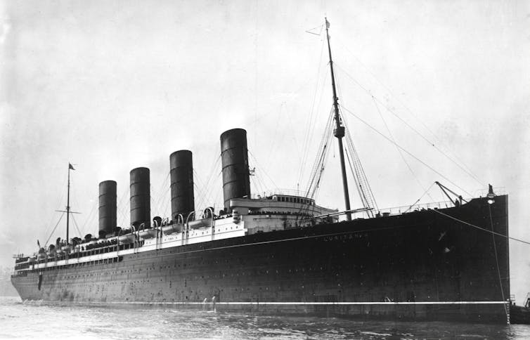 Black and white image of an old ocean liner.