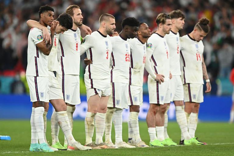 England players lining up to watch penalties in the European championships.