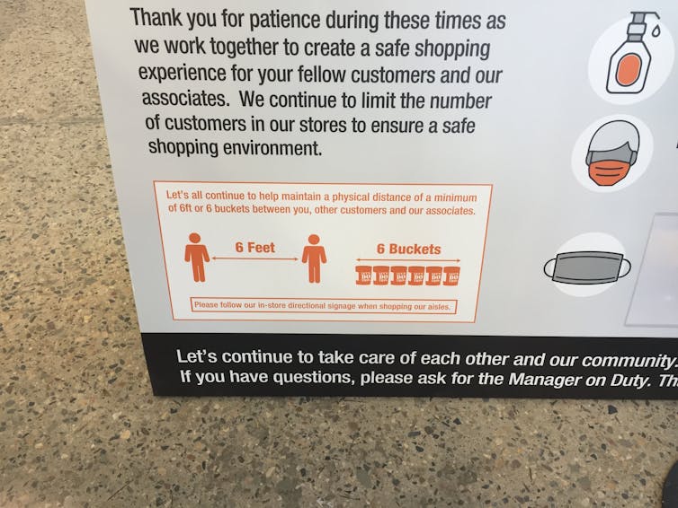 Distancing signage shows six feet imaged in buckets, with no metric equivalent.