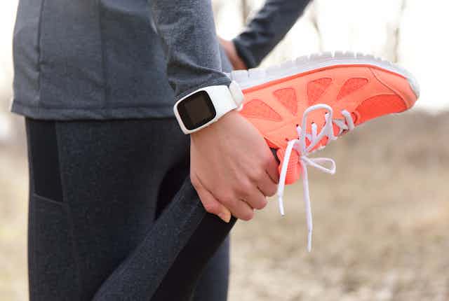 Jogger wearing a fitness tracker