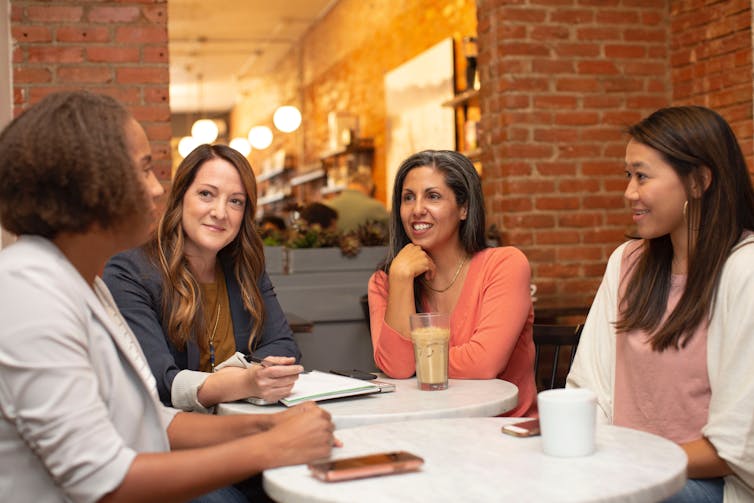 Working women share coffee