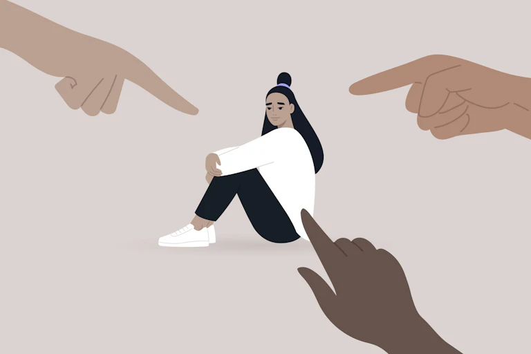 Three fingers pointing at young woman sitting on ground