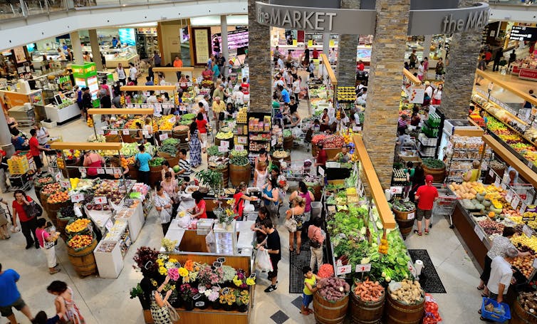 Shoppers peruse the food market