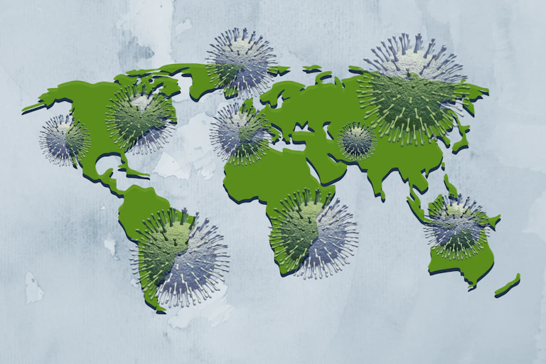 A world map superimposed with coronaviruses