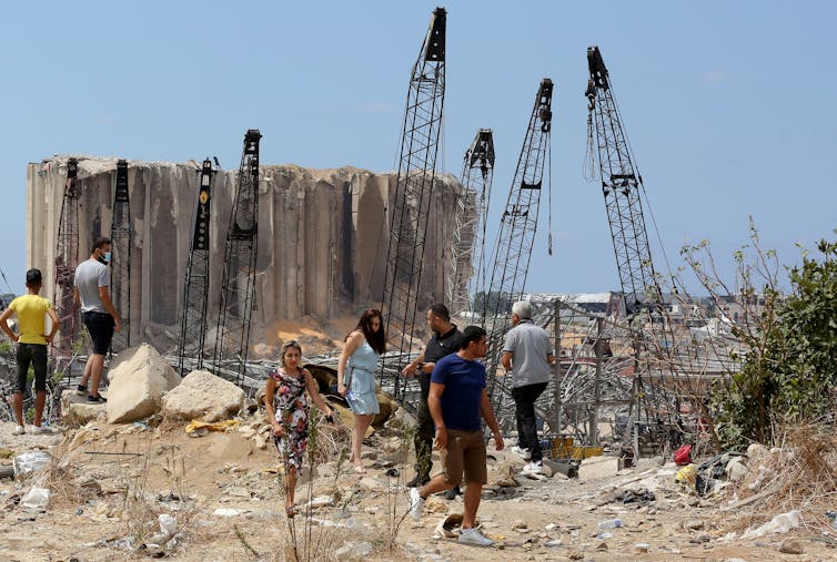 The wreckage at Beirut Port after an explosion devastated the area, with the grain silo in the background.