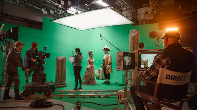 On a film set with greenscreen.