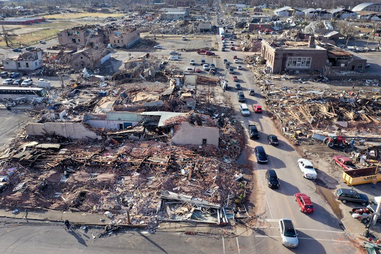 Destruction of buildings for blocks after the tornado hit Mayfield.