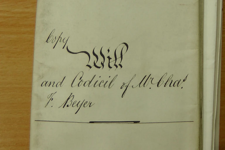 a yellowed document hand written in old-fashioned script