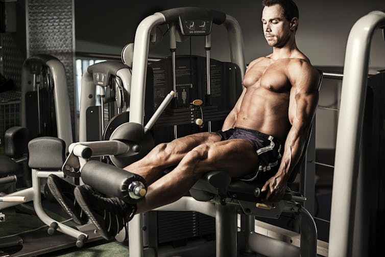 Bodybuilder doing strength training in the gym