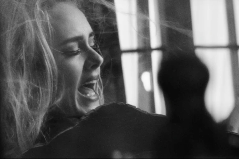 Adele singing.