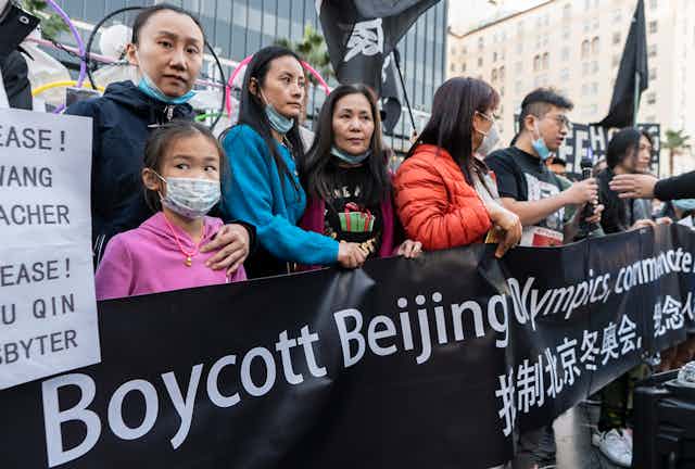 Protesters rally against the Beijing Olympics.