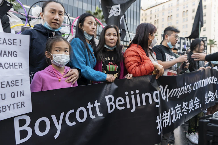 Protesters rally against the Beijing Olympics.