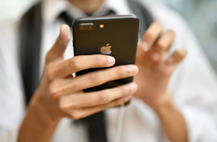 Hands holding a smart phone
