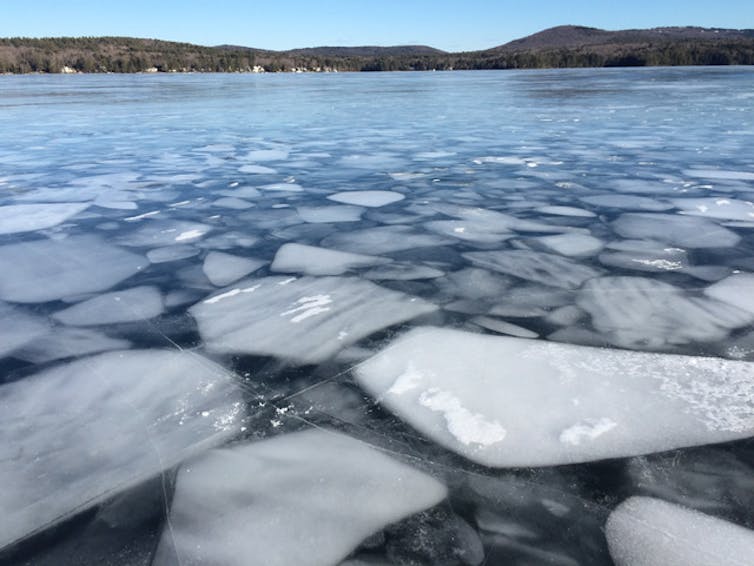 Melting ice chunks floating on Lake Sunapee, New Hampshire