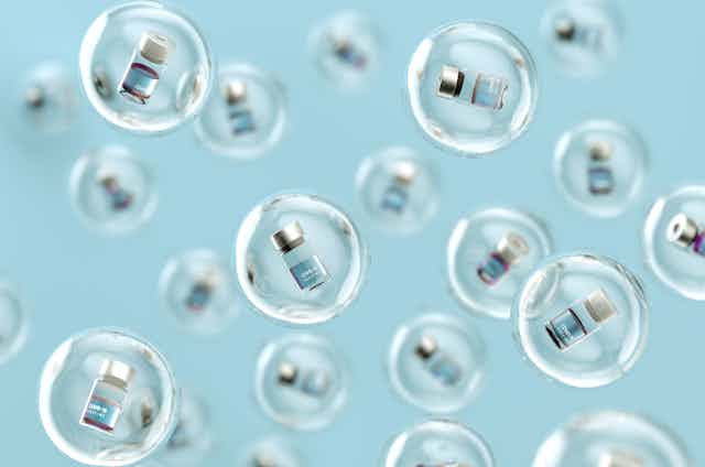 Vaccine vials in bubbles.