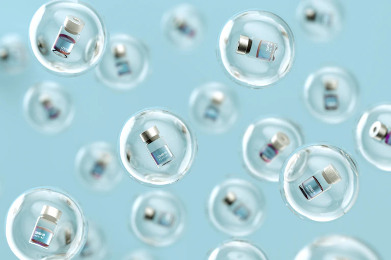 Vaccine vials in bubbles.