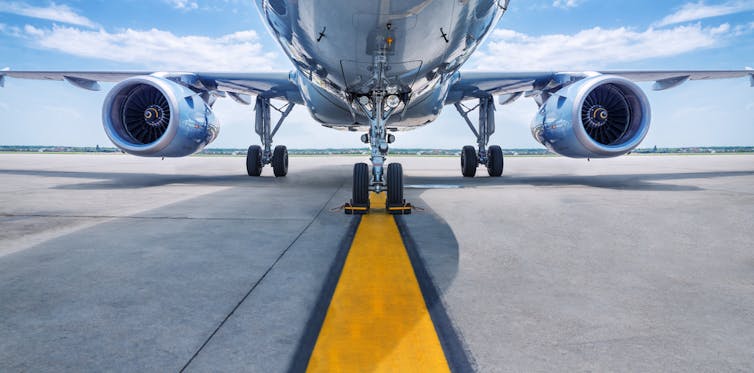 Aircraft viewed from front with two large fans on each side