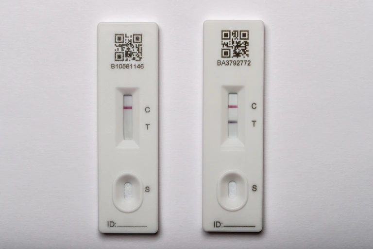 Two lateral flow tests: one positive, the other not